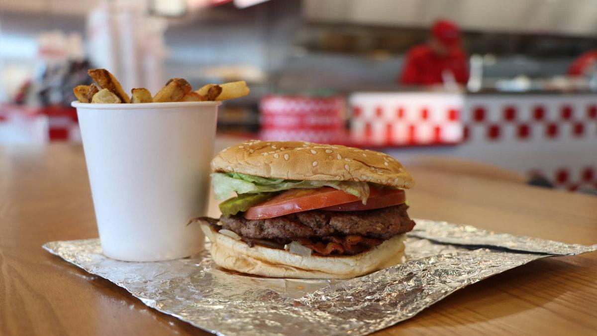  Five Guys is famous for its generous portions. Shutterstock