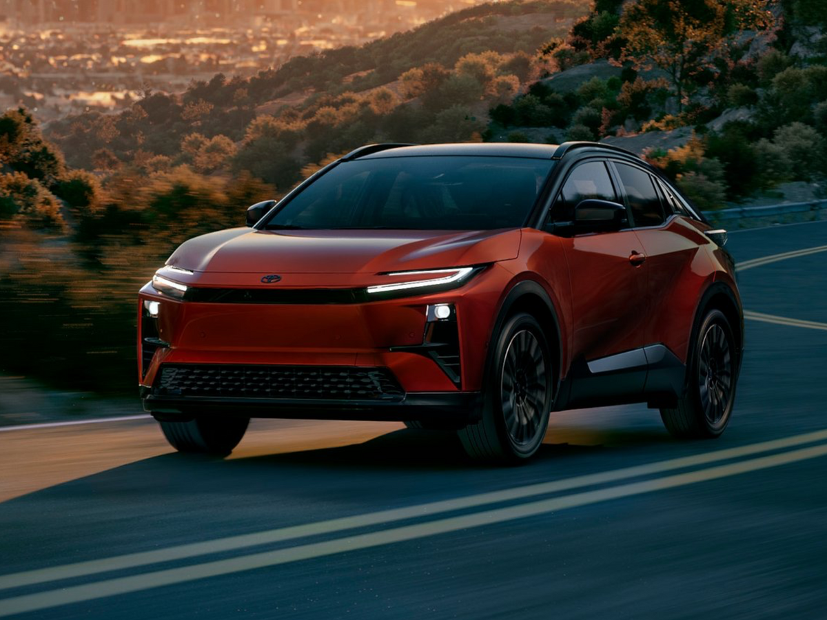 2026 Toyota C-HR XSE in Tandoori with Midnight Black 2-tone front angled view driving
