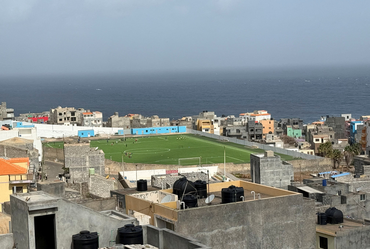 People play football in the town of Ponta do Sol on the island of Santo Antao, Cape Verde, March 7, 2026. Picture taken with a mobile phone. REUTERS/Simon Robinson