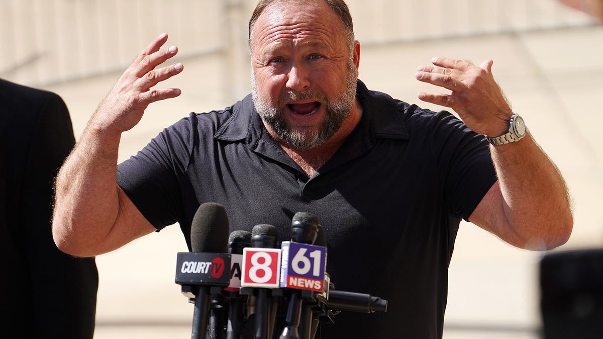 Infowars founder Alex Jones speaks to the media outside Waterbury Superior Court during his trial on Sept. 21, 2022, in Waterbury, Connecticut.