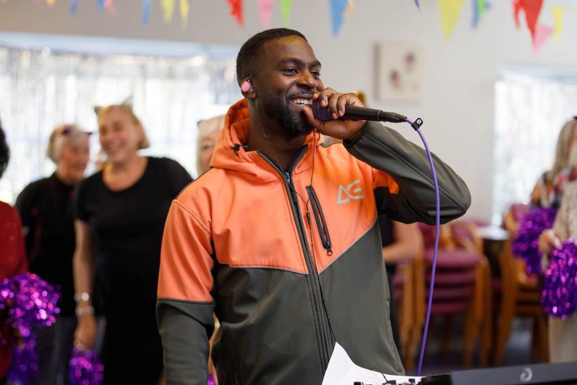  DJ AG performs a live-streamed set with Age UK Barnet participants. (Omaze via SWNS) 