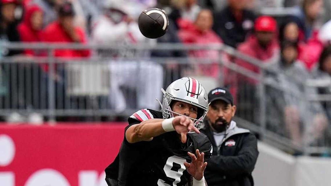  Tavien St. Clair's exciting spring-game performance had the attention of Ohio State coach Ryan Day (in back). | Samantha Madar/Columbus Dispatch / USA TODAY NETWORK via Imagn Images 
