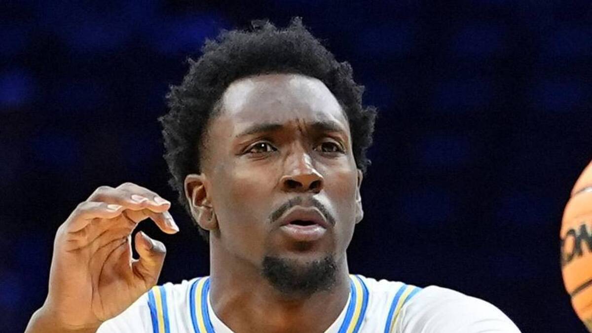  Mar 20, 2026; Philadelphia, PA, USA; UCLA Bruins center Xavier Booker (1) makes a pass against the UCF Knights in the first half during a first round game of the men's 2026 NCAA Tournament at Xfinity Mobile Arena. Mandatory Credit: Kyle Ross-Imagn Images | Kyle Ross-Imagn Images 
