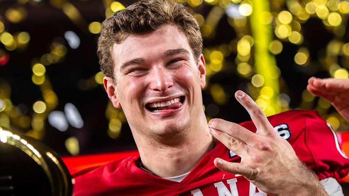  Indiana's Fernando Mendoza (15) smiles as he celebrates after the College Football Playoff National Championship college football game at Hard Rock Stadium in Miami Gardens on Monday, Jan. 19, 2026. | Rich Janzaruk/Herald-Times / USA TODAY NETWORK via Imagn Images 