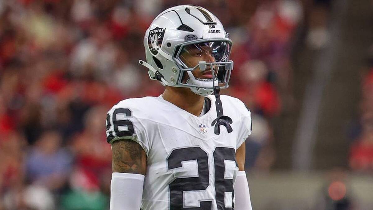  Dec 21, 2025; Houston, Texas, USA; Las Vegas Raiders cornerback Darien Porter (26) during a television timeout against the Houston Texans in the first quarter at NRG Stadium. Mandatory Credit: Thomas Shea-Imagn Images | IMAGN IMAGES via Reuters Connect 