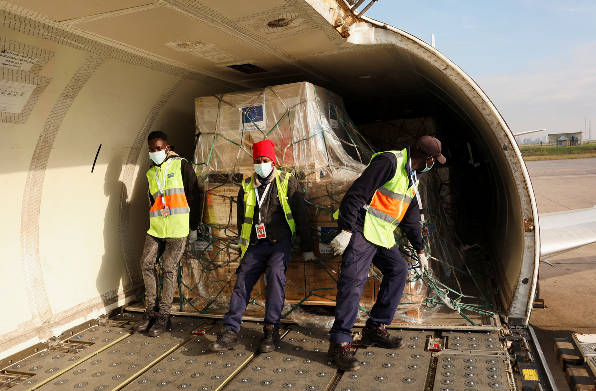 Workers load of essential medical supplies and emergency kits on an aircraft to support the affected regions in Bunia, Ituri province, amidst the Ebola outbreak in the Democratic Republic of Congo, at the Jomo Kenyatta International Airport (JKIA) in Nairobi, Kenya, June 4, 2026. REUTERS/Monicah Mwangi