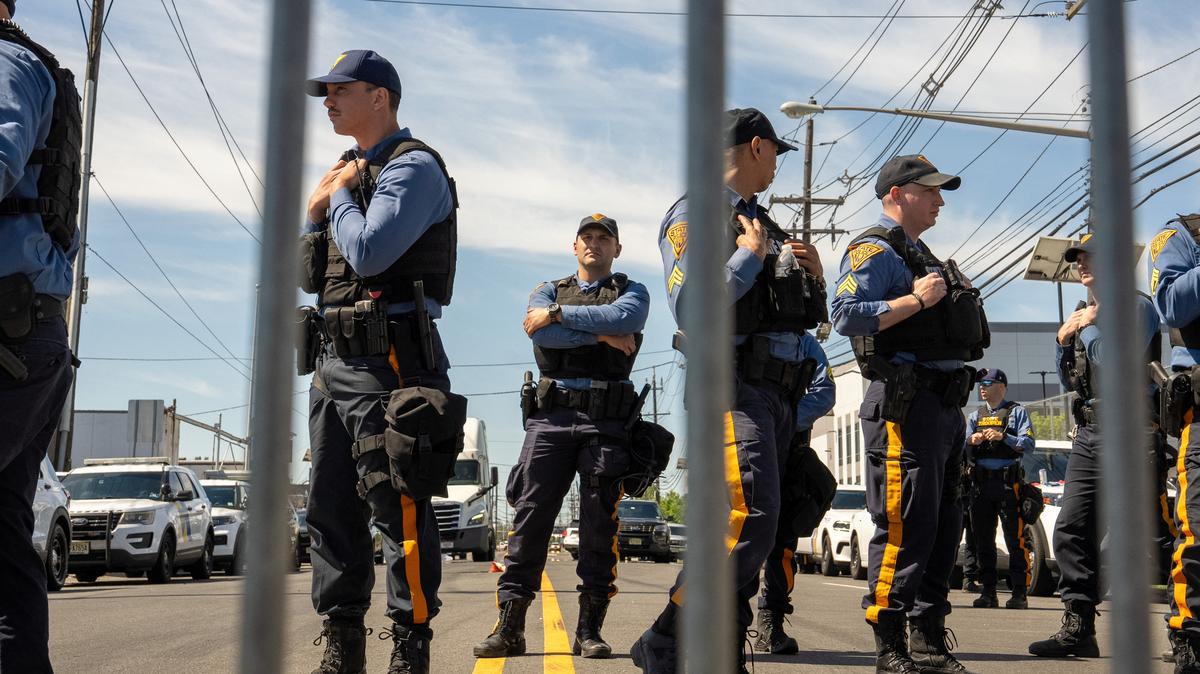 New Jersey State Police officers stand guard at a road block leading to Delaney Hall, in Newark, New Jersey, U.S., May 31, 2026. REUTERS/David 'Dee' Delgado