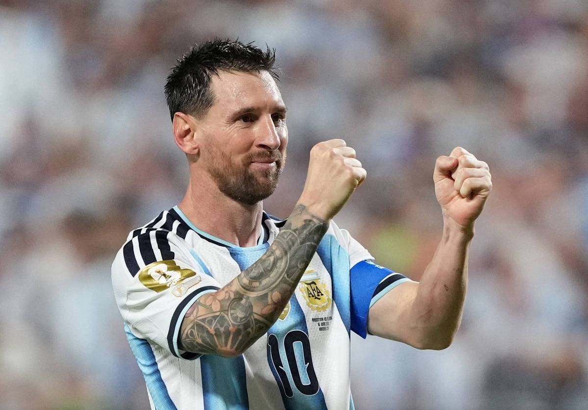  Argentina's Lionel Messi celebrates scoring their third goal to complete a hat trick. IMAGN IMAGES via Reuters/Jay Biggerstaff