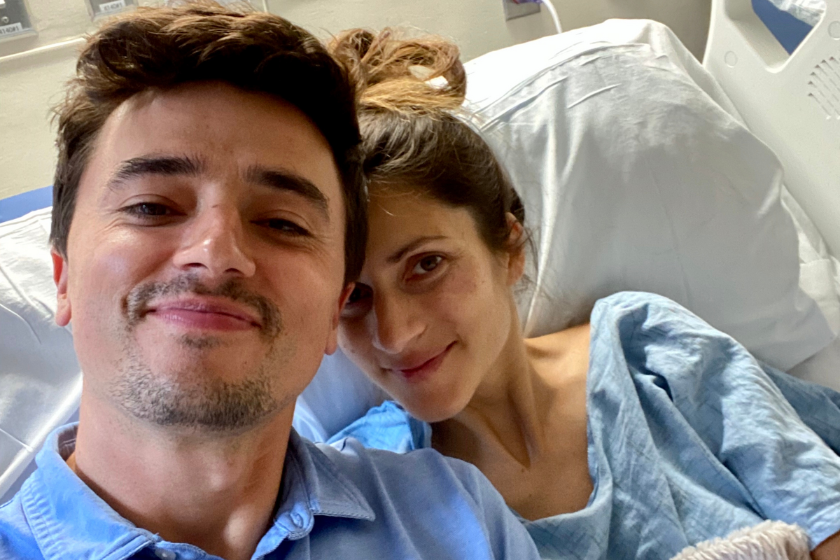  Scarpati pictured with her husband Matt Dorsey while recovering in hospital. 