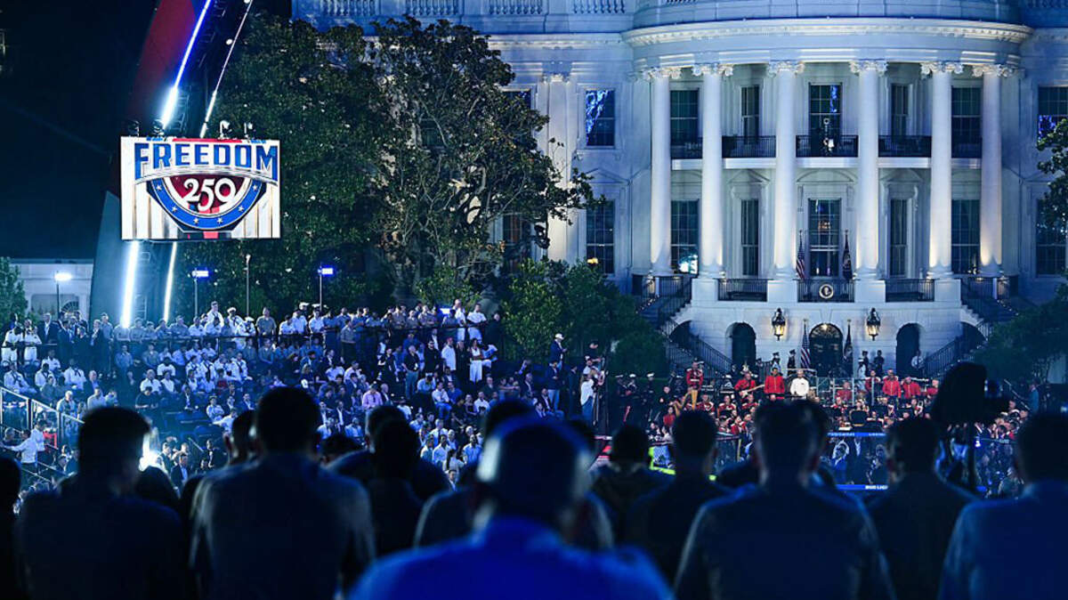 Spectators watch during the "UFC Freedom 250" mixed martial arts event on the South Lawn of the White House in Washington on Sunday.