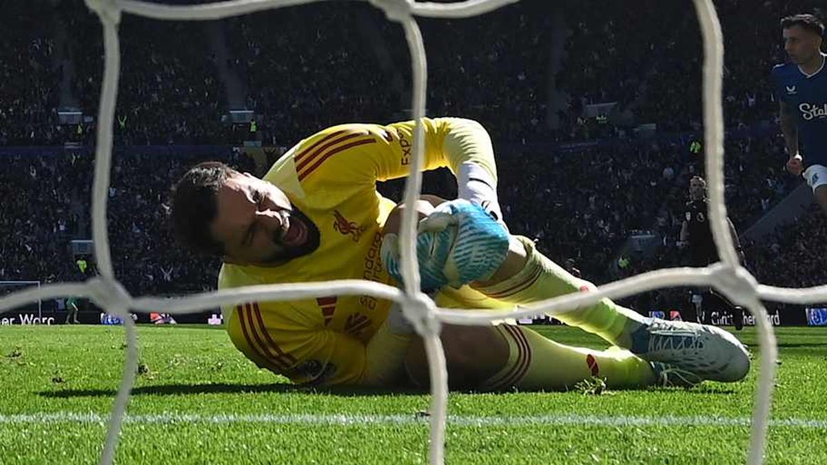  Giorgi Mamardashvili is the latest to be struck by Liverpool's injury curse. | Paul ELLIS/AFP/Getty Images 