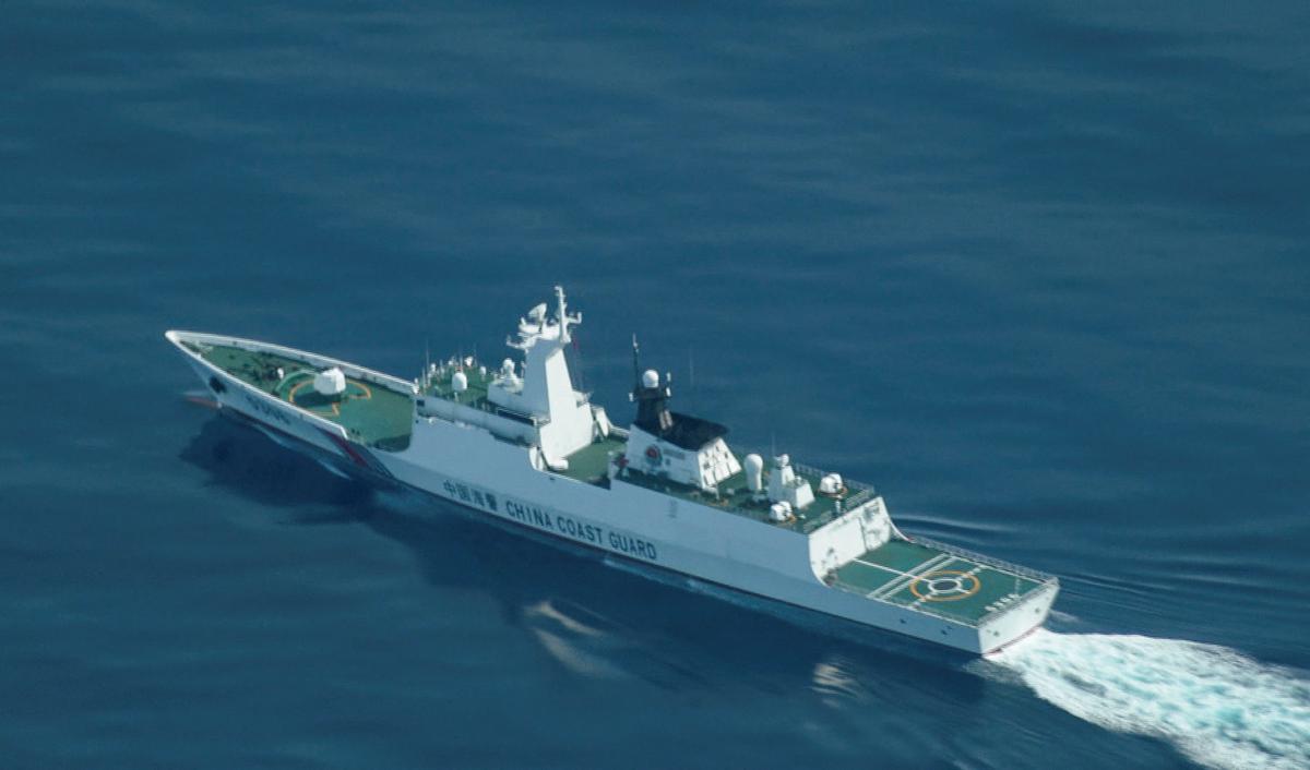 FILE PHOTO: An aerial view of a China Coast Guard ship navigating near the disputed Scarborough Shoal in the South China Sea, August 13, 2025. REUTERS/Adrian Portugal/File Photo