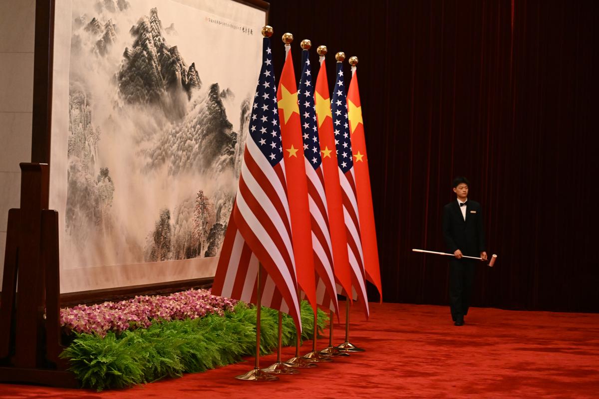 American and Chinese flags are displayed at the Great Hall of the People in Beijing on Thursday, May 14, 2026, during President Donald Trump's visit to China for a two-day summit with China's leader, Xi Jinping. (Kenny Holston/The New York Times)