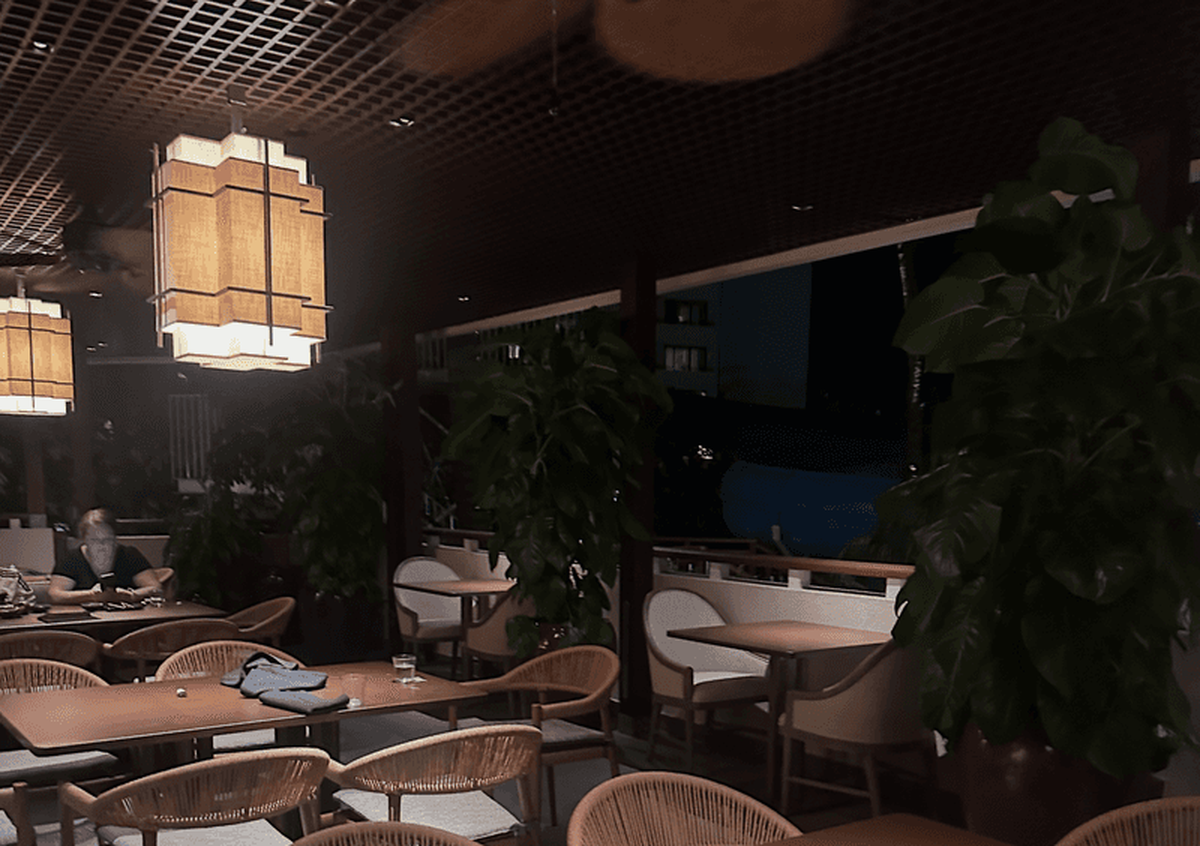  The moody dining room at ShinSen comes alive at night with geometric lanterns and lush tropical greenery. Photo credit: April Benshosan 