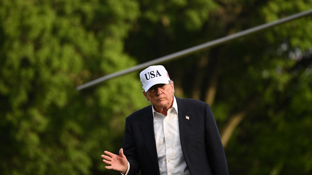 U.S. President Donald Trump waves after stepping off Marine One on the South Lawn of the White House in Washington, D.C., on May 15, 2026. Trump is returning from Beijing where he met with Chinese President Xi Jinping. (Alex Wroblewski/AFP/Getty Images/TNS)