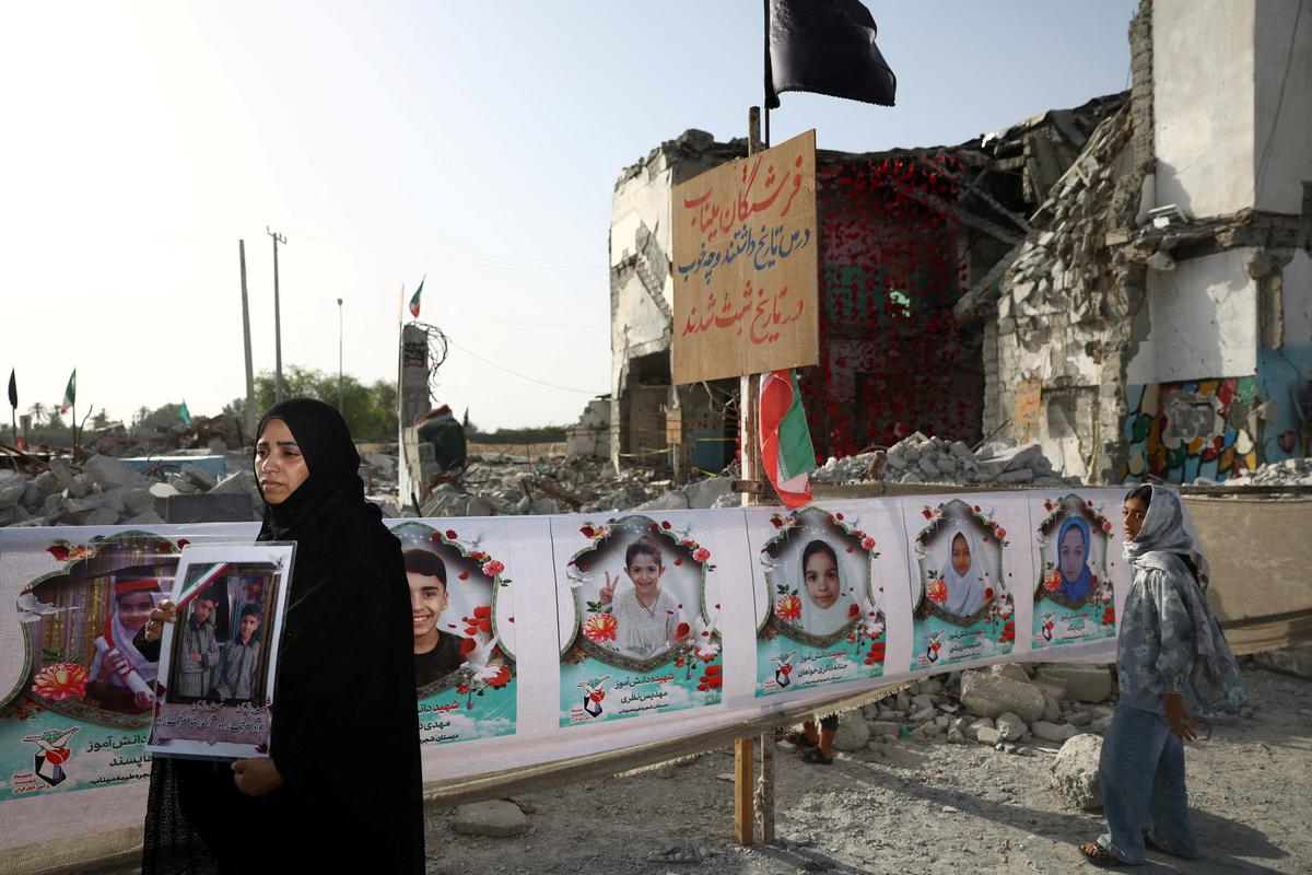 Raheleh, an Iranian woman who lost two of her children in Minab school strike on February 28, reacts at Minab school in Minab, Iran, May 21, 2026. Majid Asgaripour/WANA (West Asia News Agency) via REUTERS