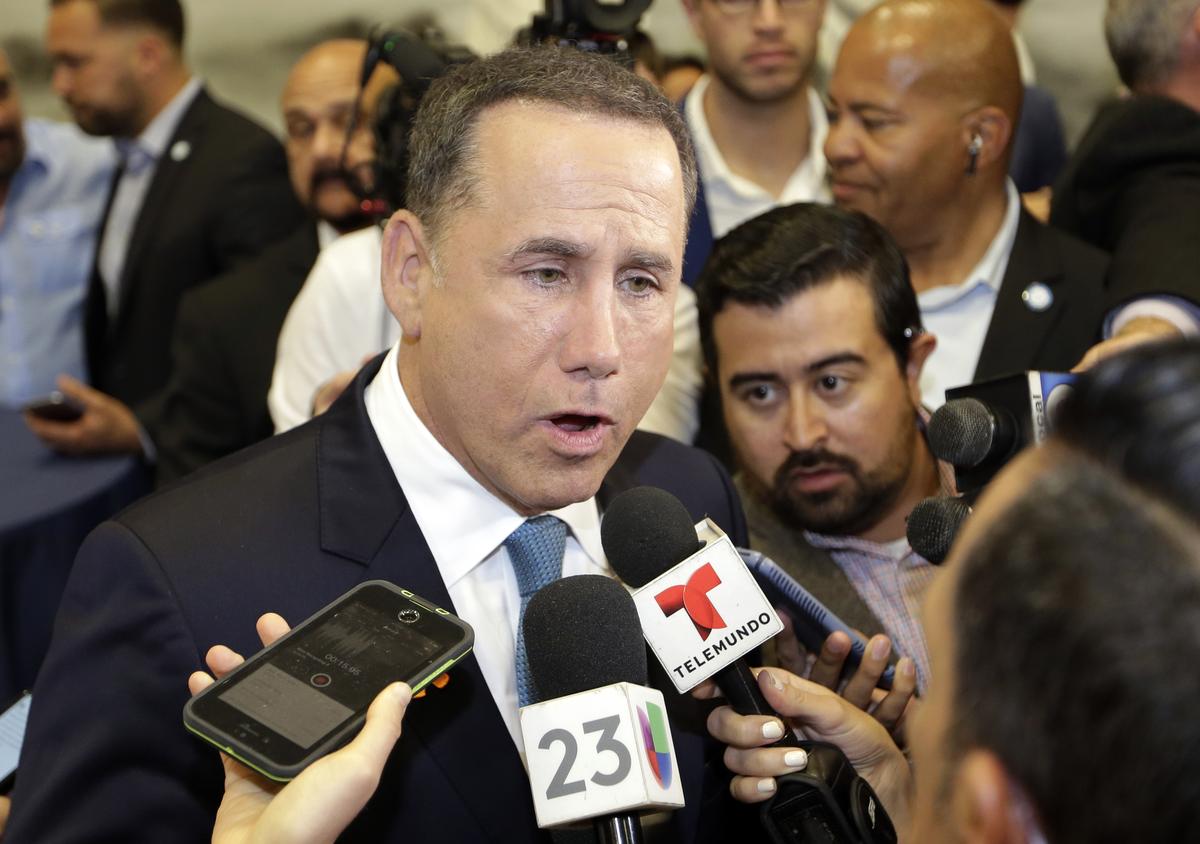  Democratic gubernatorial candidate Philip Levine talks to the news media after giving a concession speech on August 28, 2018, in Miami. 