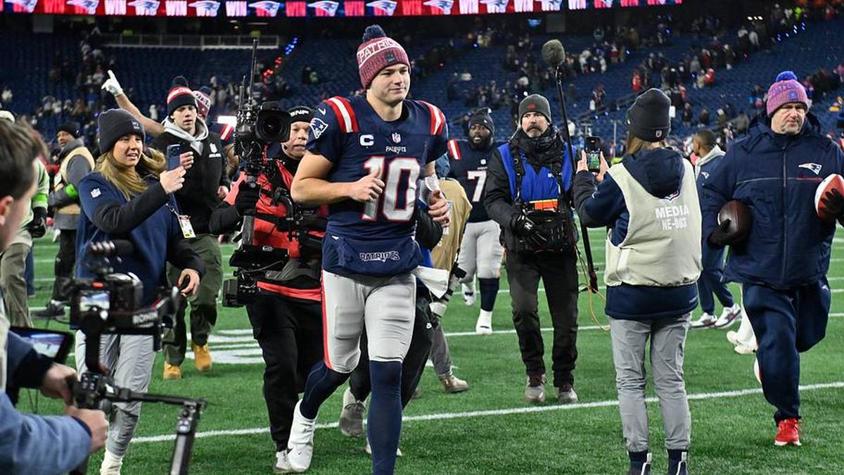  Jan 11, 2026; Foxborough, MA, USA; New England Patriots quarterback Drake Maye (10) jogs off the field after defeating the Los Angeles Chargers in an AFC Wild Card Round game at Gillette Stadium. Mandatory Credit: Eric Canha-Imagn Images | Eric Canha-Imagn Images 