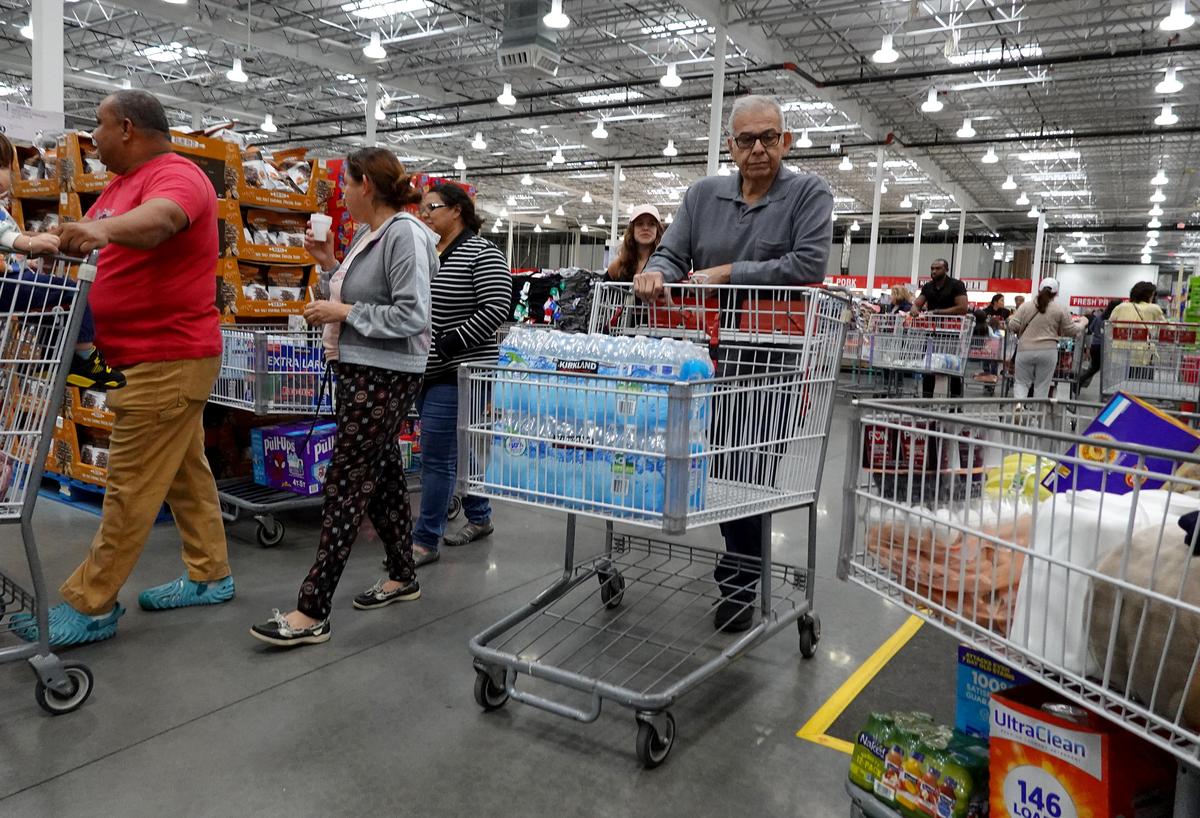 Customers shopping at Costco, 2023