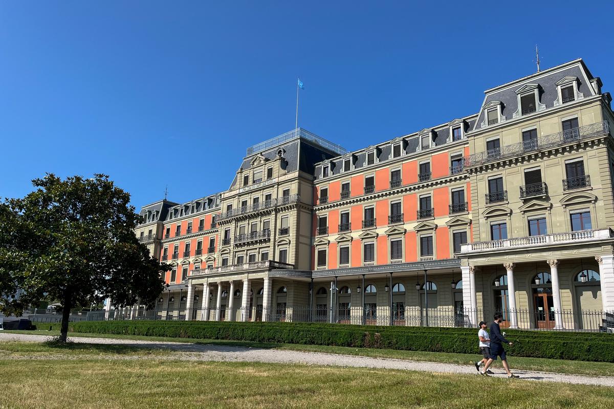 People walk past the Palais Wilson, base of the U.N. High Commissioner for Human Rights, and the former headquarters of the League of Nations, in Geneva, Switzerland, June 17, 2025. REUTERS/Emma Farge
