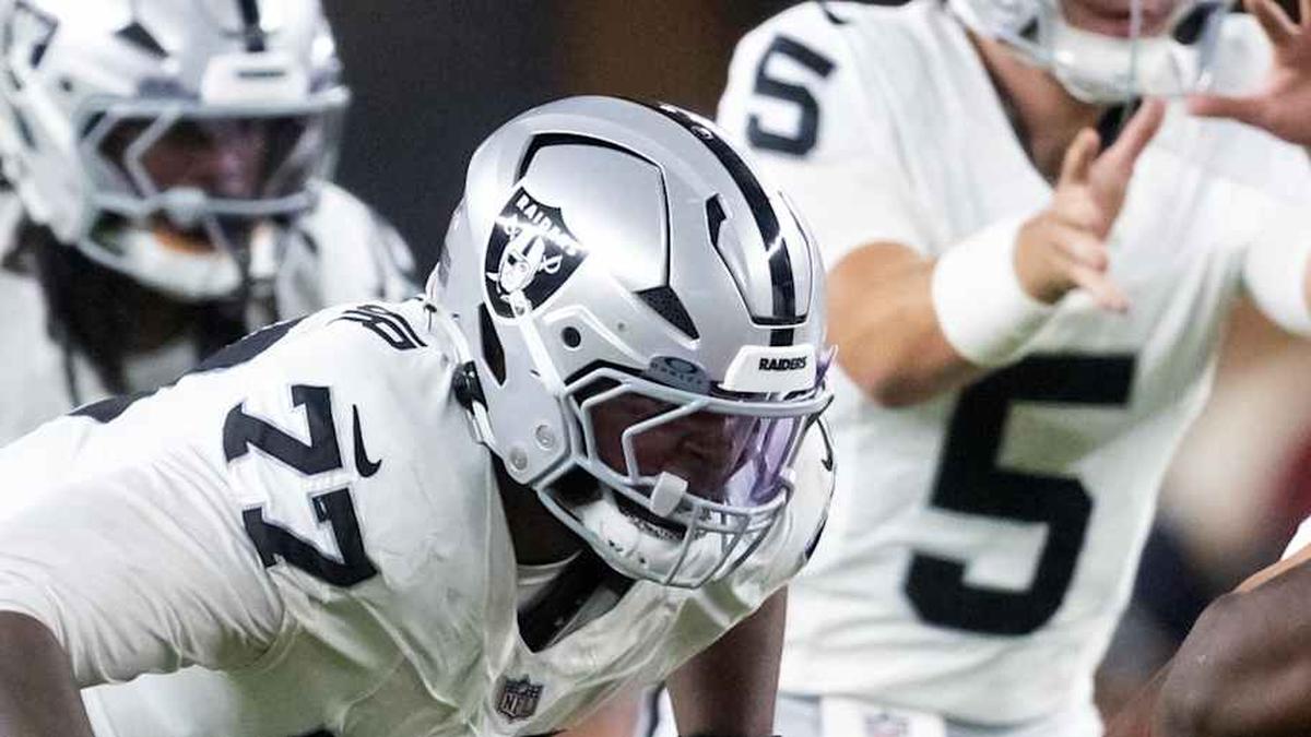  Aug 23, 2025; Glendale, Arizona, USA; Las Vegas Raiders tackle Thayer Munford Jr. (77) against the Arizona Cardinals during a preseason NFL game at State Farm Stadium. Mandatory Credit: Mark J. Rebilas-Imagn Images | Mark J. Rebilas-Imagn Images 
