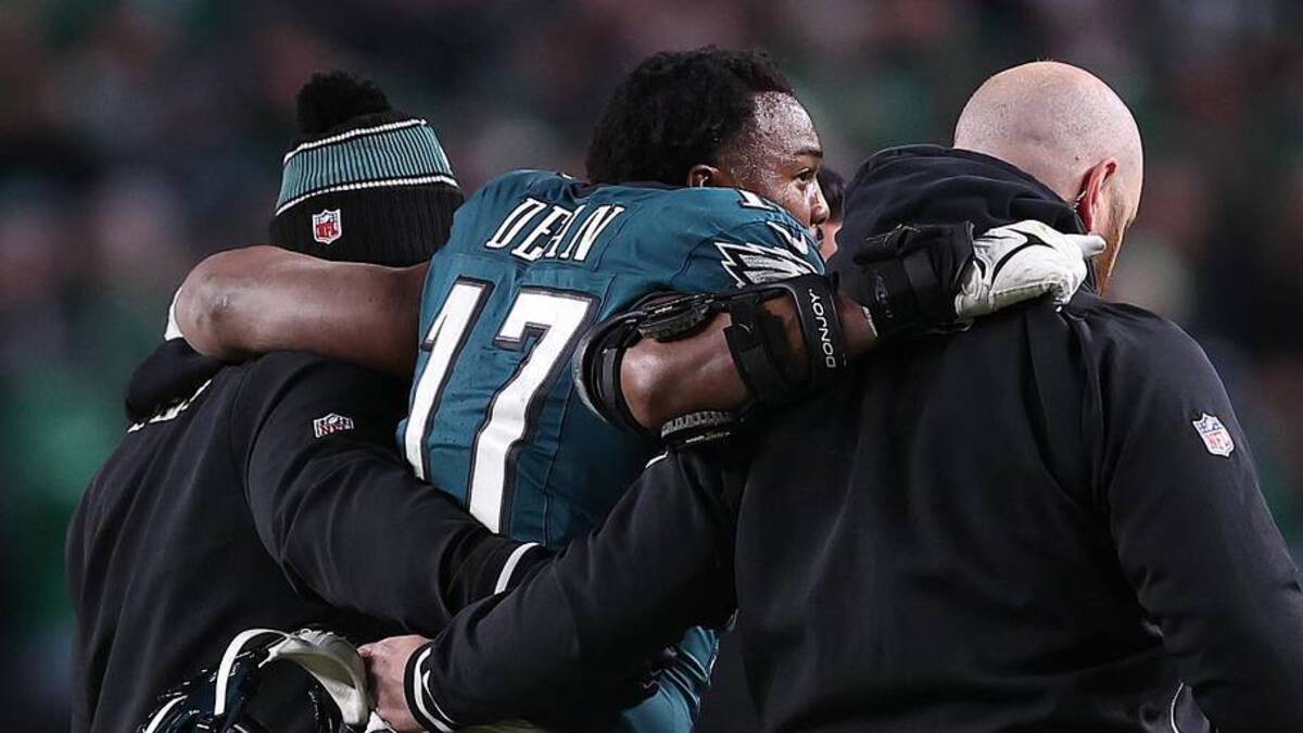  Jan 12, 2025; Philadelphia, Pennsylvania, USA; Philadelphia Eagles linebacker Nakobe Dean (17) is helped off the field against the Green Bay Packers during the first half in an NFC wild card game at Lincoln Financial Field. Mandatory Credit: Bill Streicher-Imagn Images | Bill Streicher-Imagn Images 