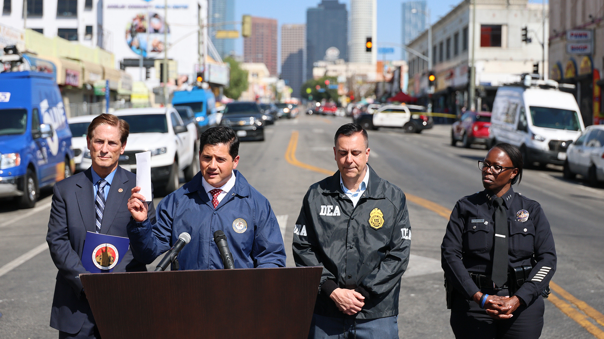First Assistant U.S. Attorney for the Central District of California, Bill Essayli, second from left, speaks during a news conference with Los Angeles District Attorney Nathan Hochman, DEA agent Anthony Chrysanthis and Los Angeles Police Department assistant chief Emada Tingirides watching during a joint operation between Los Angeles Police Department and federal agents targeting “illegal narcotics activity” at MacArthur Park in Los Angeles on Thursday, June 4, 2026. (Allen J. Schaben/Los Angeles Times/TNS)