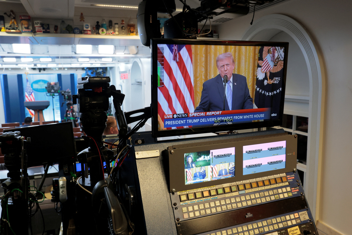 A screen plays U.S. President Donald Trump's address to the nation from the White House in Washington, D.C., U.S., July 16, 2026. REUTERS/Kylie Cooper
