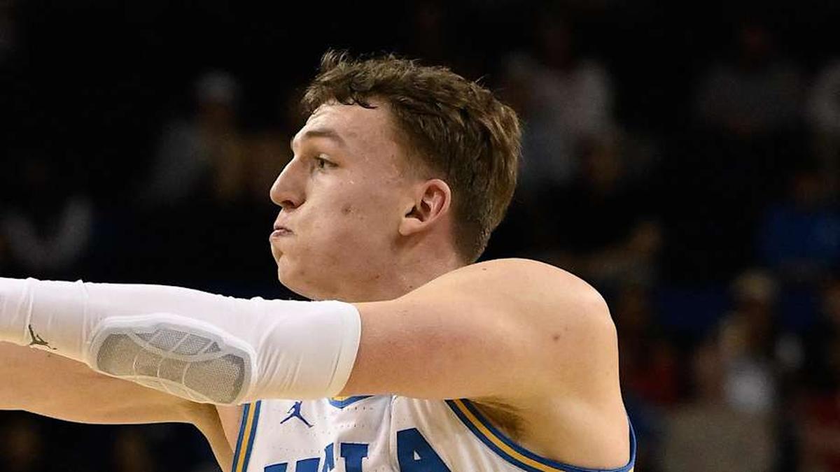  Mar 3, 2026; Los Angeles, California, USA; UCLA Bruins forward Tyler Bilodeau (34) passes the ball as Nebraska Cornhuskers forward Braden Frager (5) defends during the 1st half at Pauley Pavilion presented by Wescom Financial. Mandatory Credit: Robert Hanashiro-Imagn Images | Robert Hanashiro-Imagn Images 