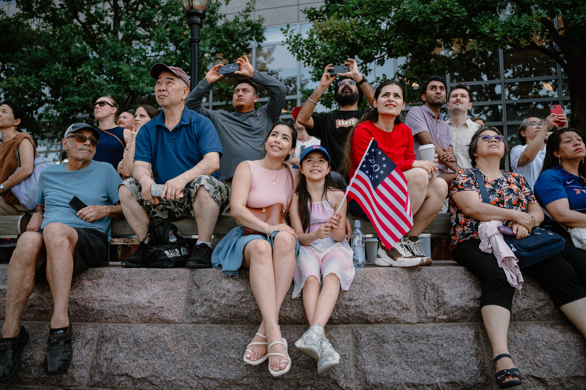 Spectators watch the International Aerial Review in Lower Manhattan during the 250th anniversary of the United States' independence in New York, July 4, 2026. America celebrates the 250th anniversary of its independence today, with people from one end of the country to the other marking the milestone with fireworks, parades and concerts. (Lucia Vazquez/The New York Times)