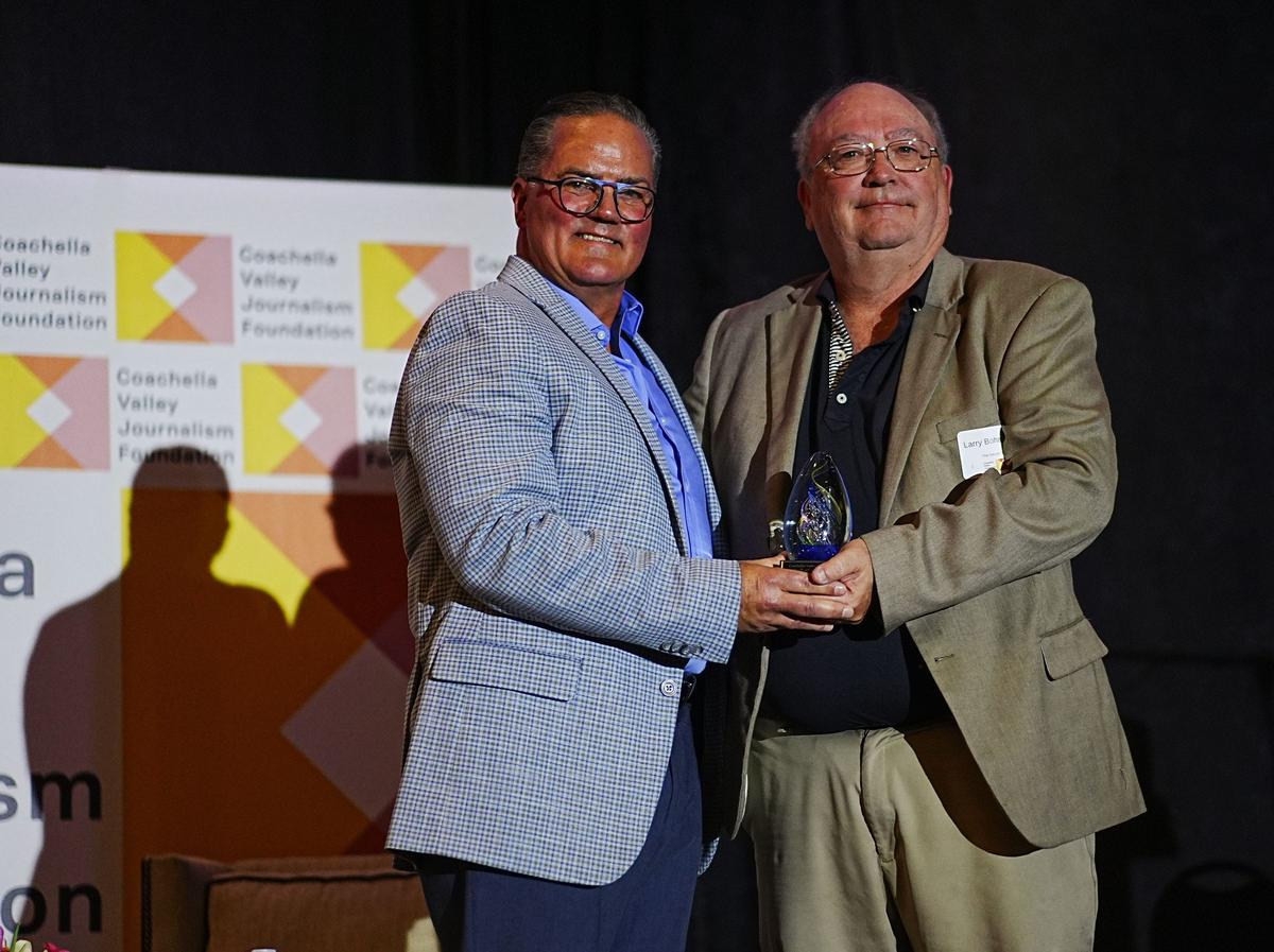 Larry Bohannan, right, is inducted into the 2026 Media Hall of Fame during the Coachella Valley Journalism Awards by CVJF president Randy Lovely in Rancho Mirage, Calif., Feb. 24, 2026.