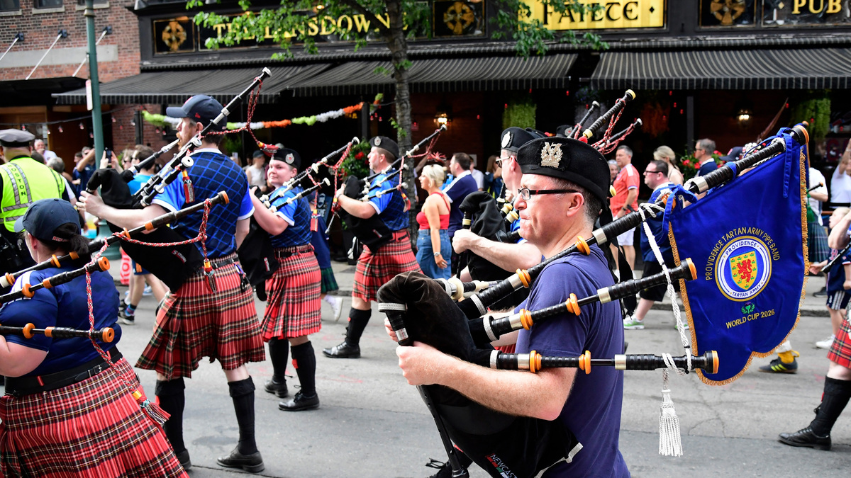 Soccer Football - FIFA World Cup 2026 - Scotland's Tartan Army march to Boston's Fenway Park baseball stadium - Boston, Massachusetts, U.S. - June 14, 2026 Scotland fans wearing kilts and playing the bagpipes during the march to Fenway Park IMAGN IMAGES via Reuters/Bob Dechiara