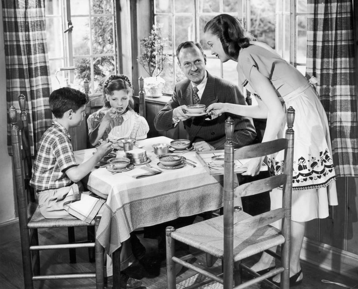  Mid-century ideals for women imagined them as full-time mothers and homemakers. Lambert/Hulton Archive/Getty Images 