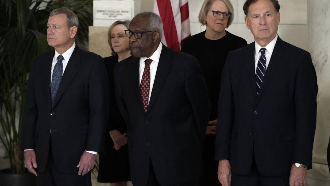 Chief Justice of the United States John Roberts, Justice Clarence Thomas and Justice Samuel Alito attend a private ceremony for retired Supreme Court Justice Sandra Day O'Connor before public repose in the Great Hall at the Supreme Court in Washington, D.C., on Dec. 18, 2023. File Pool photo by Jacquelyn Martin/UPI