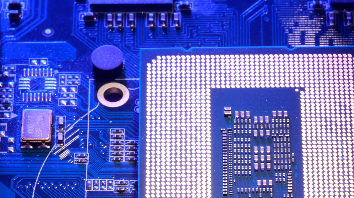 FILE PHOTO: Computer motherboard and chip appear in this illustration taken August 25, 2025. REUTERS/Dado Ruvic/Illustration/File Photo
