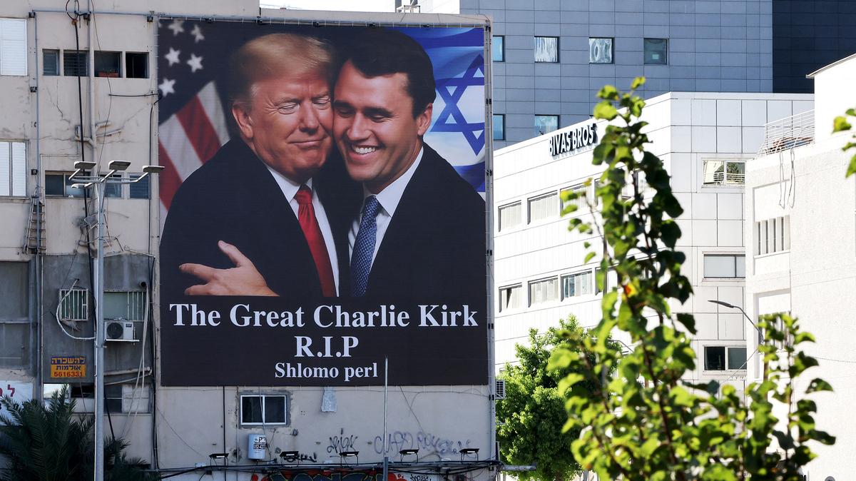 A billboard in Israel shows an image of President Donald Trump embracing prominent right-wing activist Charlie Kirk, who was hit by a single bullet while addressing a large crowd at Utah Valley University in the town of Orem on Sept. 10.