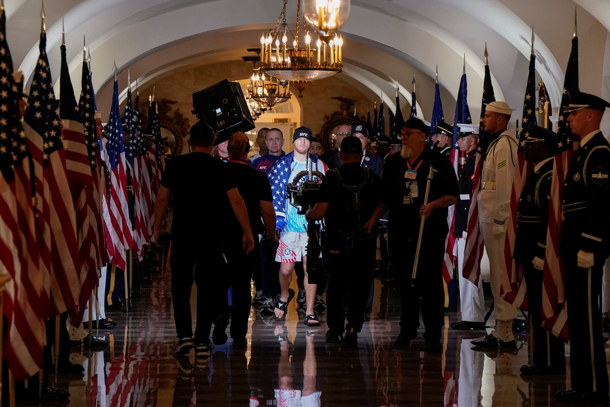 Justin Gaethje walks through a White House hallway to his bout during UFC Freedom 250 in Washington, D.C., U.S., June 15, 2026. REUTERS/Elizabeth Frantz/Pool