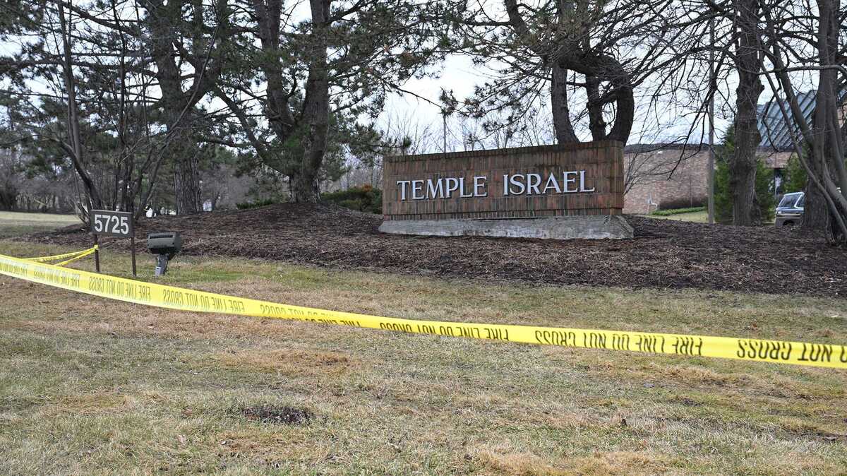 Yellow police tape blocks the entrance to the Temple Israel synagogue is block on March 13, 2026, in West Bloomfield Township, Michigan, one day after a man intentionally drove at truck into the building. (Clarence Tabb Jr./The Detroit News/TNS)