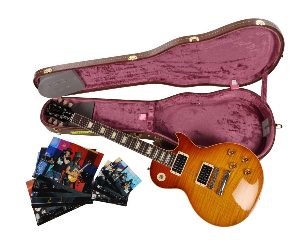  Slash's Guns N' Roses Photo-Matched Tour Stage-Used and Autographed Gibson Les Paul '59 Custom Shop Guitar. (Propstore via SWNS) 