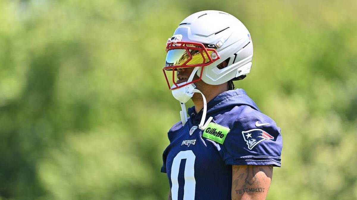  Jun 9, 2026; Foxborough, MA, USA; New England Patriots cornerback Christian Gonzalez (0) looks on during minicamp at Gillette Stadium. Mandatory Credit: Eric Canha-Imagn Images | Eric Canha-Imagn Images 