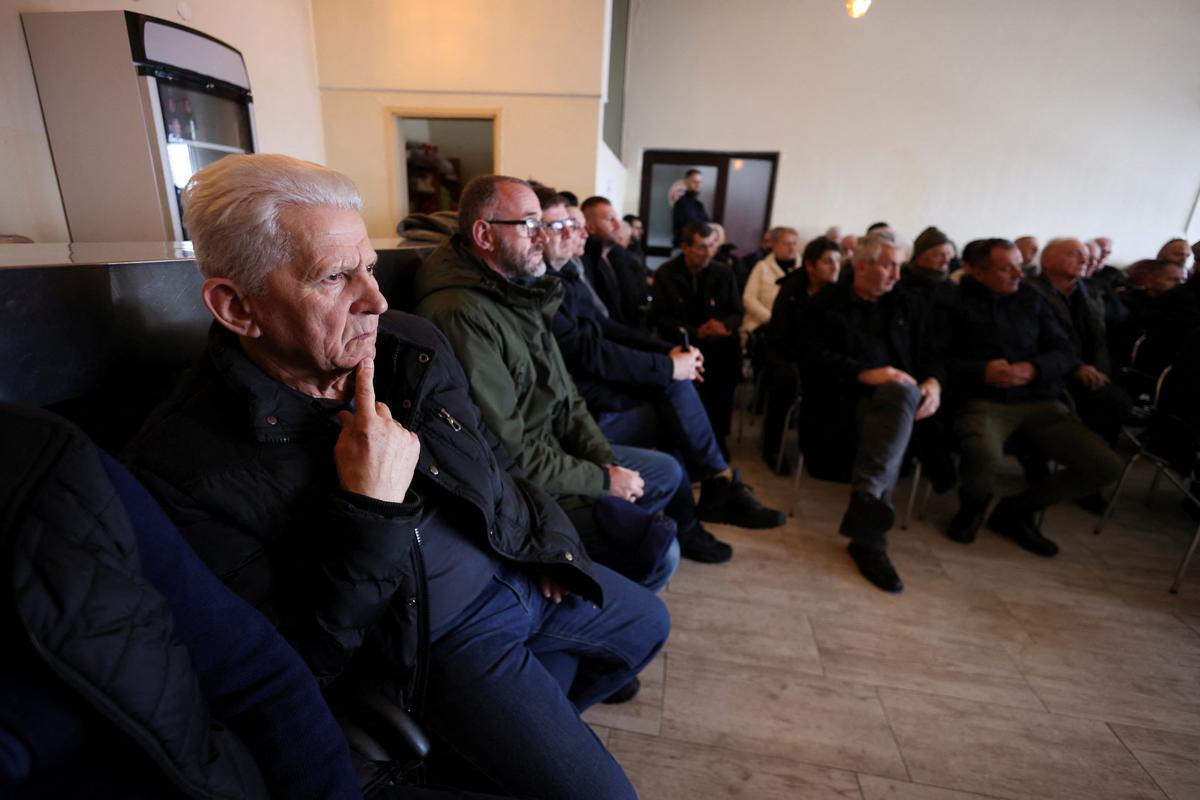 Concerned residents of the village of Przici attend a meeting where the harmful effects of lead in the body are demonstrated, in Vares, Bosnia and Herzegovina, February 21, 2026. Recent tests have detected lead in the blood of more than 300 nearby residents, fueling fear and uncertainty about the future of the town. REUTERS/Amel Emric