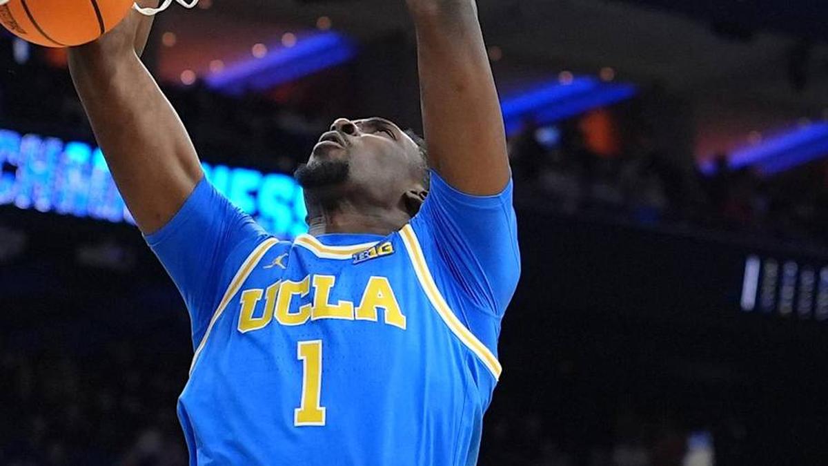  Mar 22, 2026; Philadelphia, PA, USA; UCLA Bruins center Xavier Booker (1) dunks the ball against the UConn Huskies in the first half during a second round game of the men's 2026 NCAA Tournament at Xfinity Mobile Arena. Mandatory Credit: Kyle Ross-Imagn Images | Kyle Ross-Imagn Images 