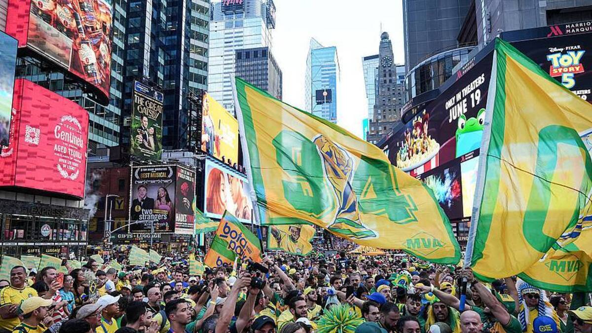  Brazilian fans gathered in Times Square before the opening match. | Daniela Porcelli/Getty Images 