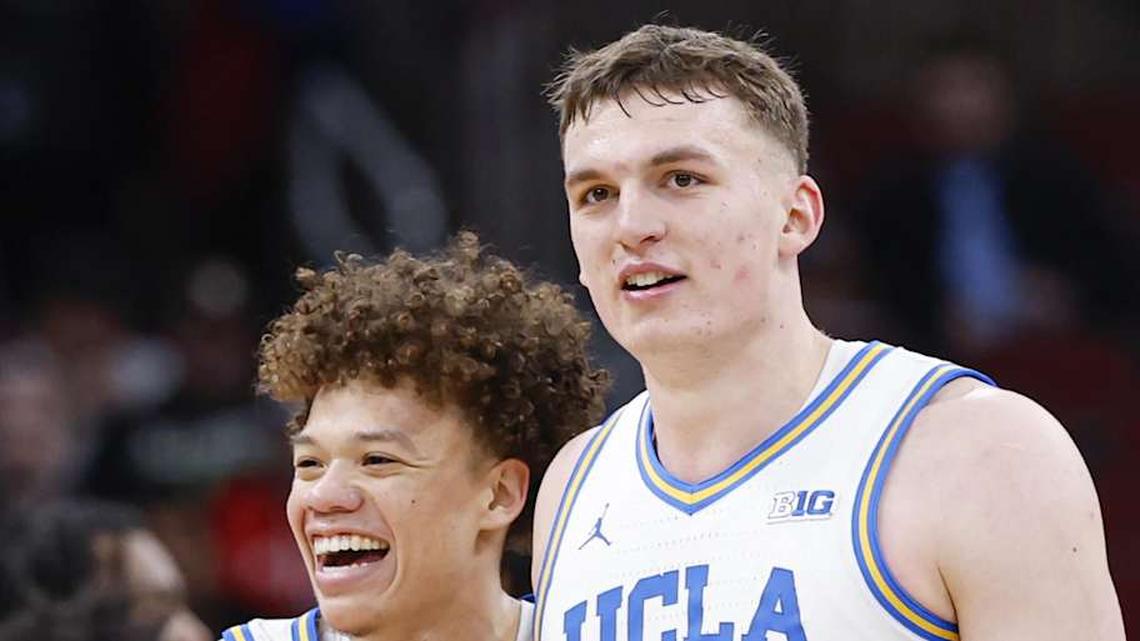  Mar 12, 2026; Chicago, IL, USA; UCLA Bruins guard Trent Perry (0) and forward Tyler Bilodeau (34) smile during the second half at United Center. Mandatory Credit: Kamil Krzaczynski-Imagn Images | Kamil Krzaczynski-Imagn Images 