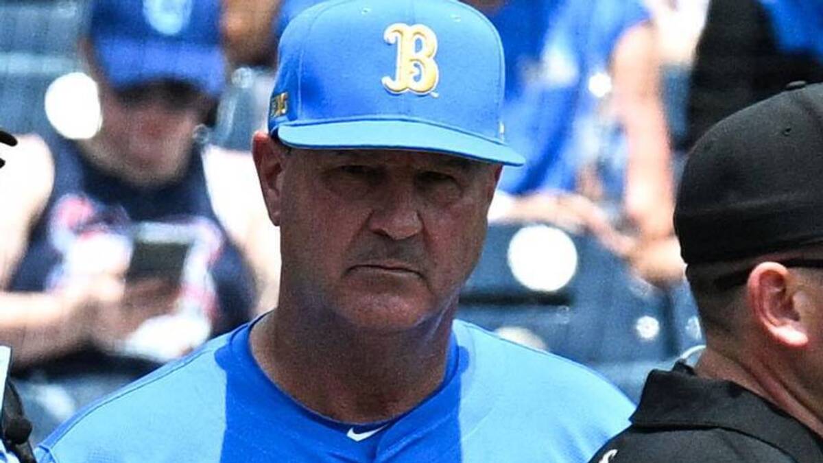  Jun 14, 2025; Omaha, Neb, USA; Murray State Racers head coach Dan Skirka and UCLA Bruins head coach John Savage meet with umpires before the game at Charles Schwab Field. Mandatory Credit: Steven Branscombe-Imagn Images | Steven Branscombe-Imagn Images 