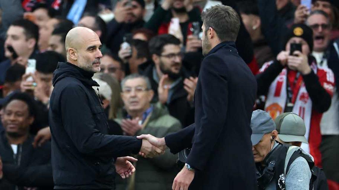  Pep Guardiola (left) and Michael Carrick (right) both face uncertain futures. | Darren Staples/AFP/Getty Images 