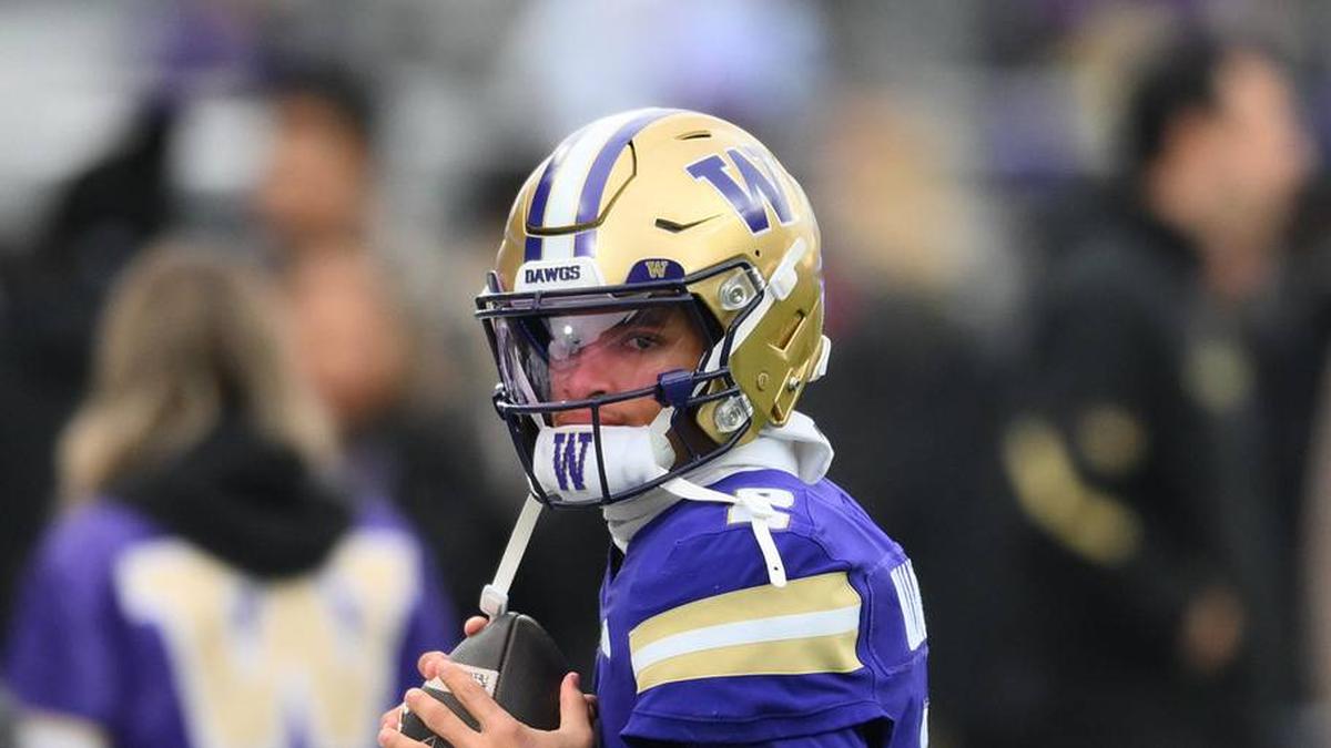  Nov 29, 2025; Seattle, Washington, USA; Washington Huskies quarterback Demond Williams Jr. (2) during warmup before the game against the Oregon Ducks at Husky Stadium. Mandatory Credit: Steven Bisig-Imagn Images | Steven Bisig-Imagn Images 