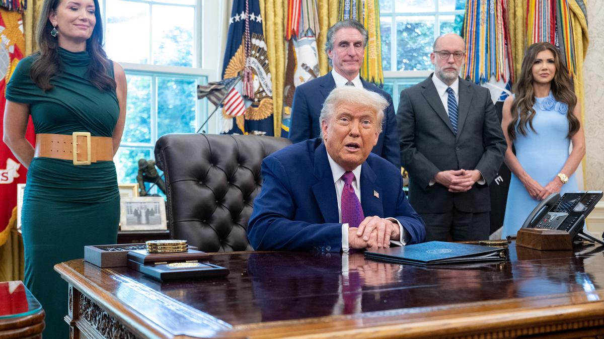 President Donald Trump with members of his cabinet. From left, Agriculture Secretary Brooke Rollins; Interior Secretary Doug Burgum; Russell Vought, head of the Office of Management and Budget; and Kristi Noem, head of the Department of Homeland Security.