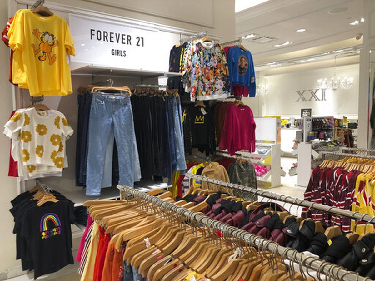 A Forever 21 store is shown, Monday, Sept. 30, 2019, in Aventura, Fla. The low-price fashion chain, a one-time hot destination for teen shoppers that fell victim to its own rapid expansion and changing consumer tastes, has filed for Chapter 11 bankruptcy protection.