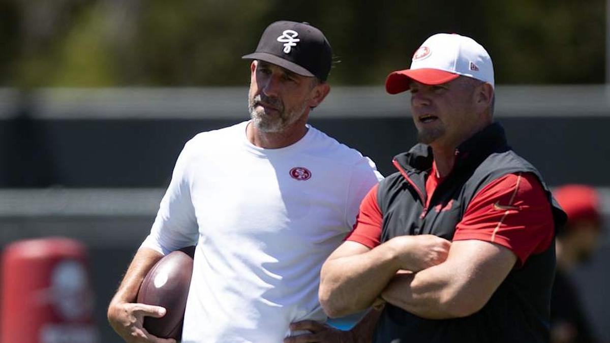  May 9, 2025; Santa Clara, CA, USA; San Francisco 49ers head coach Kyle Shanahan, left, confers with special teams coordinator Brant Boyer during the teamís rookie minicamp. Mandatory Credit: D. Ross Cameron-Imagn Images | D. Ross Cameron-Imagn Images 